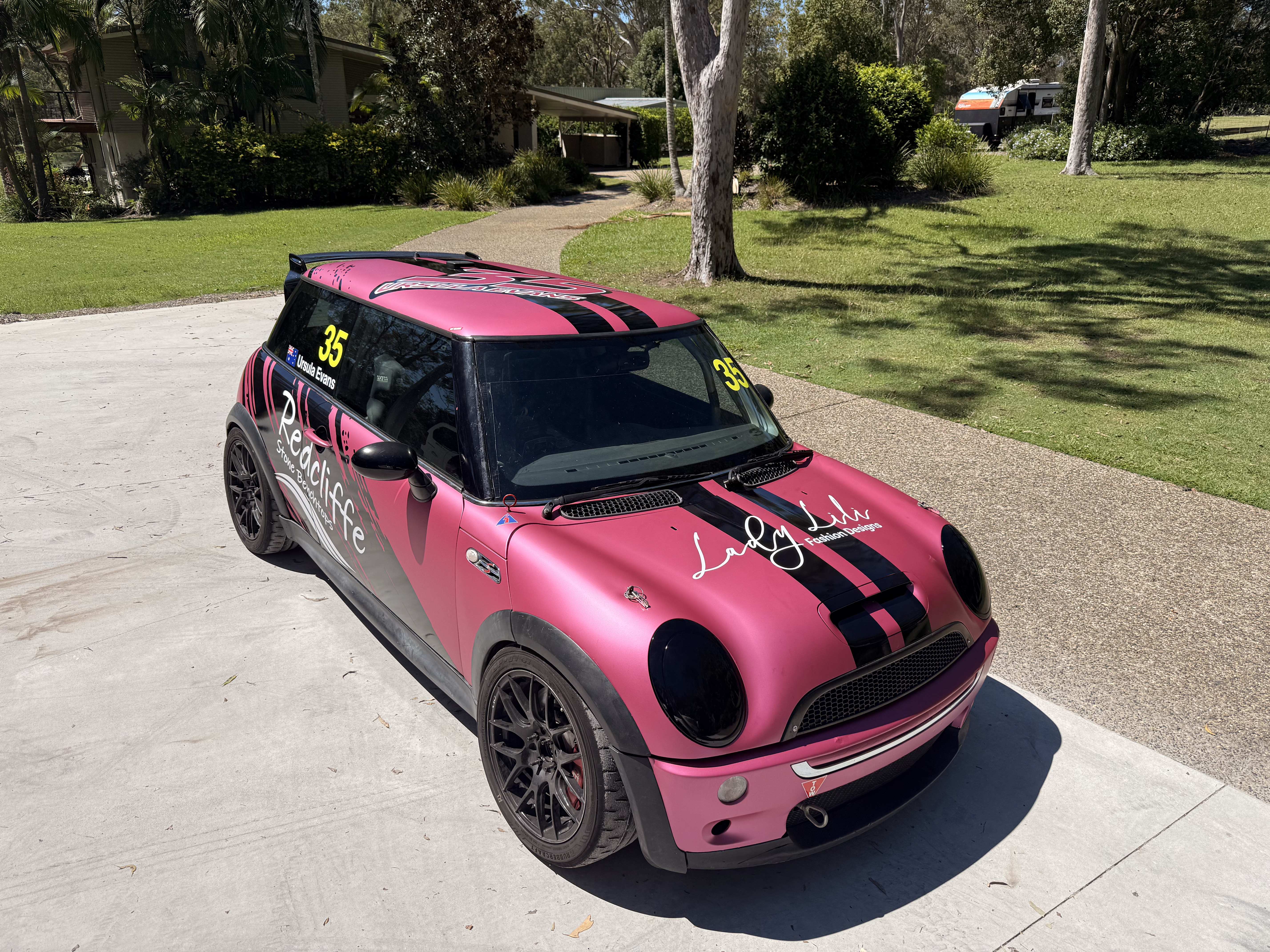 Team preparing a vehicle wrap install