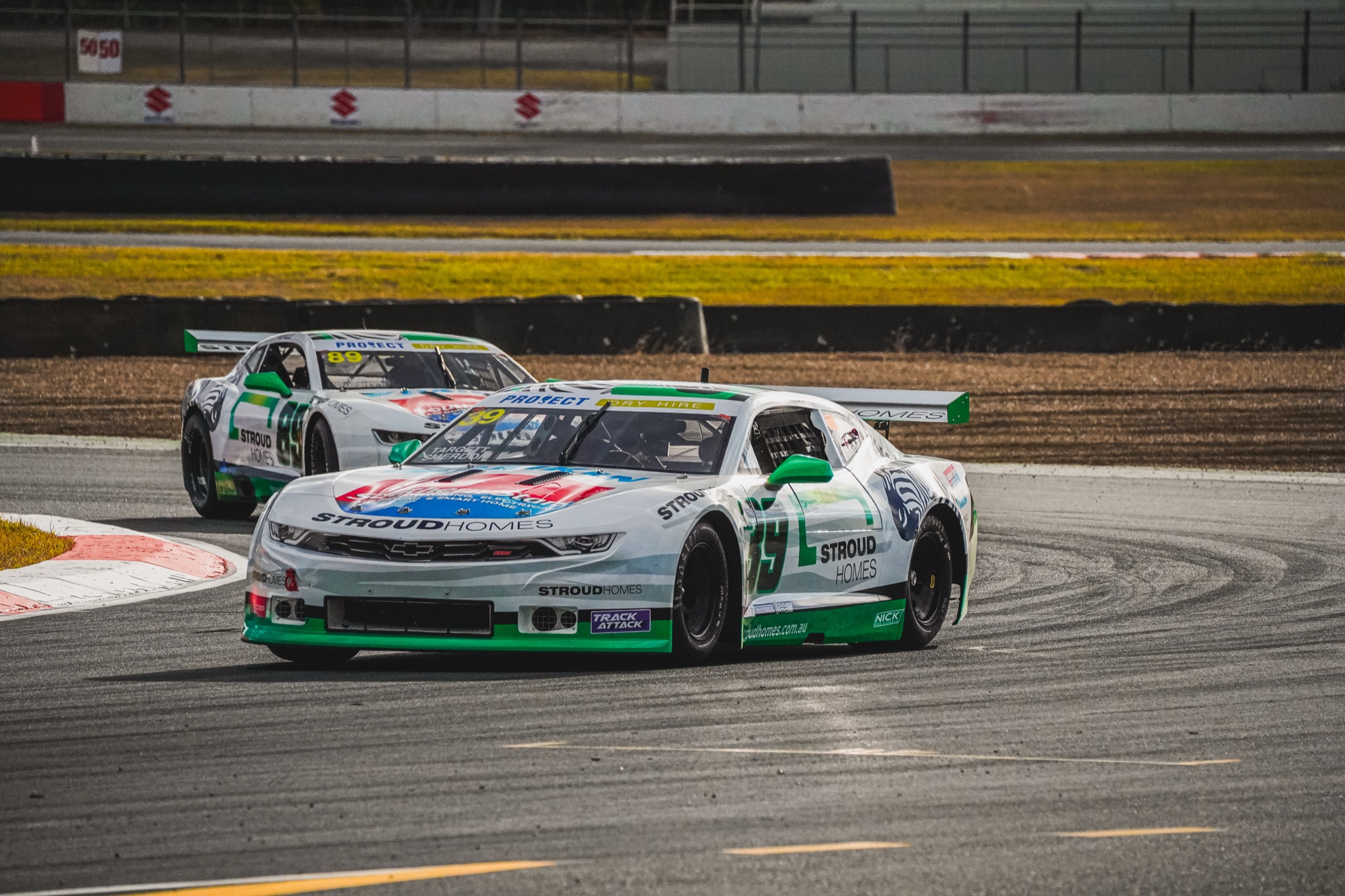 Professionally branded race car with custom sponsor graphics